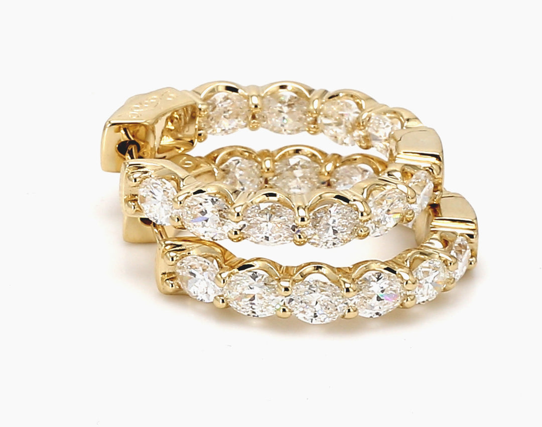 0.75""  Inside out hoop earrings east west style in 14K YG with prong set (20) oval cut diamonds.  D4.83ct.t.w.