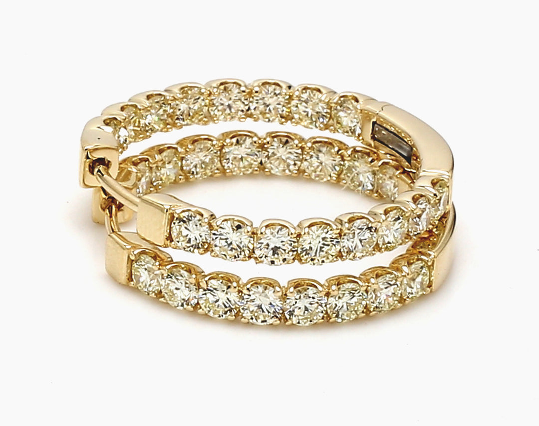 0.75"" Inside out hoop earrings in 14K YG with prong set (32) round diamonds.  D2.90ct.t.w.