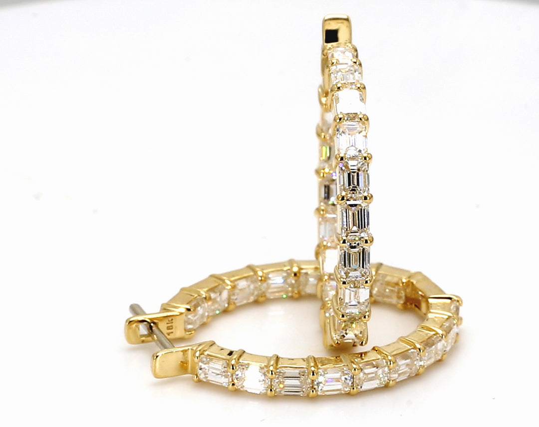 1.25"" Oval shaped inside out earrings in 18K YG with prong set (32) emerald cut diamonds.  D6.03ct.t.w.
