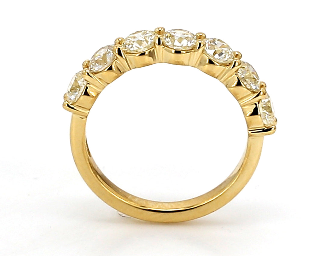 7-stone band in 18K YG with prong set round diamonds.  D1.72ct.t.w.  Size 6
