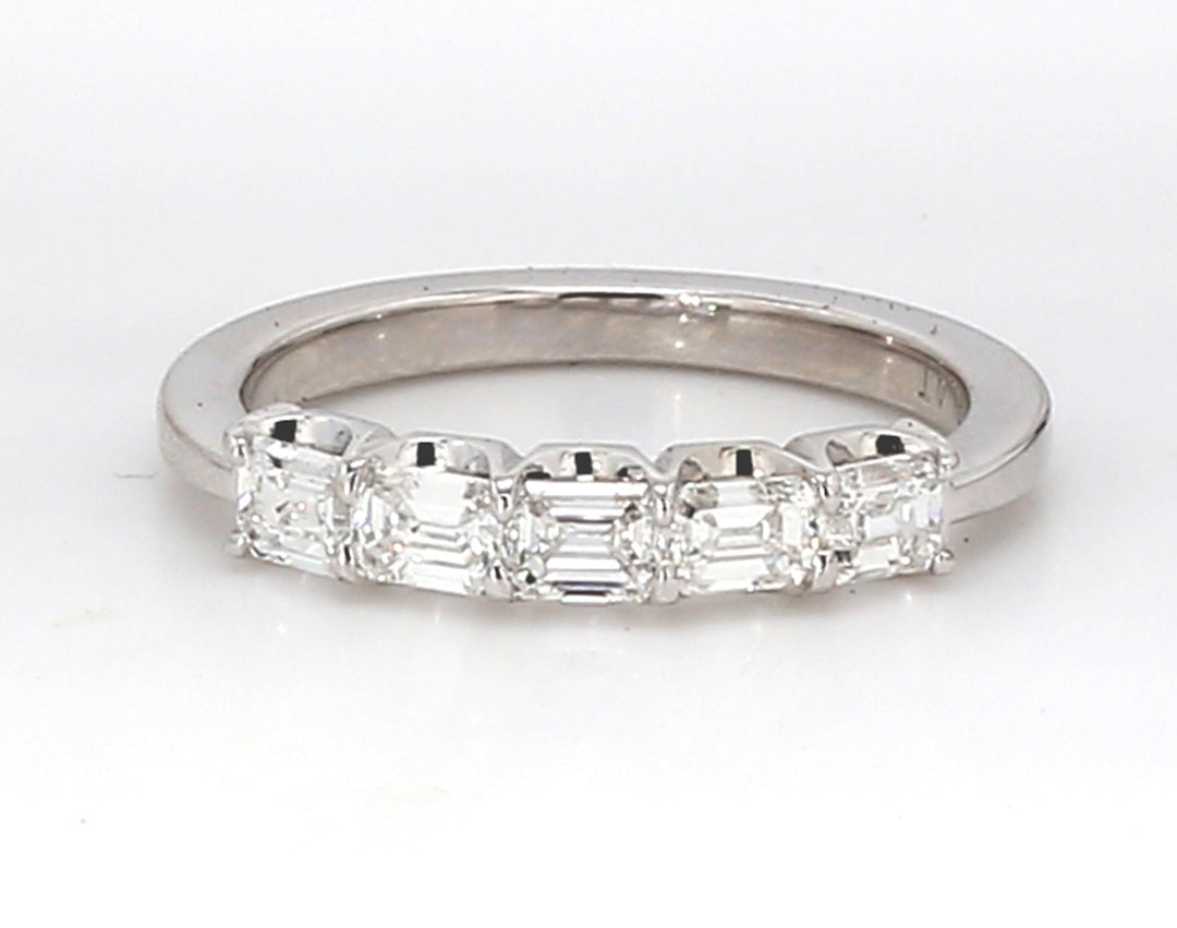 5-stone band east to west style in platinum with prong set emerald cut diamonds.  D0.81ct.t.w.  Size 5.75