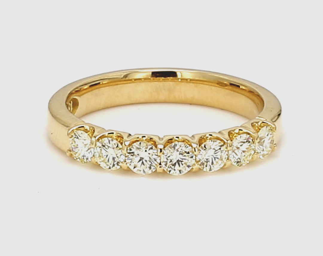 7-stone band in 18K YG with U-prong set round diamonds.  D0.60ct.t.w.  Size 6