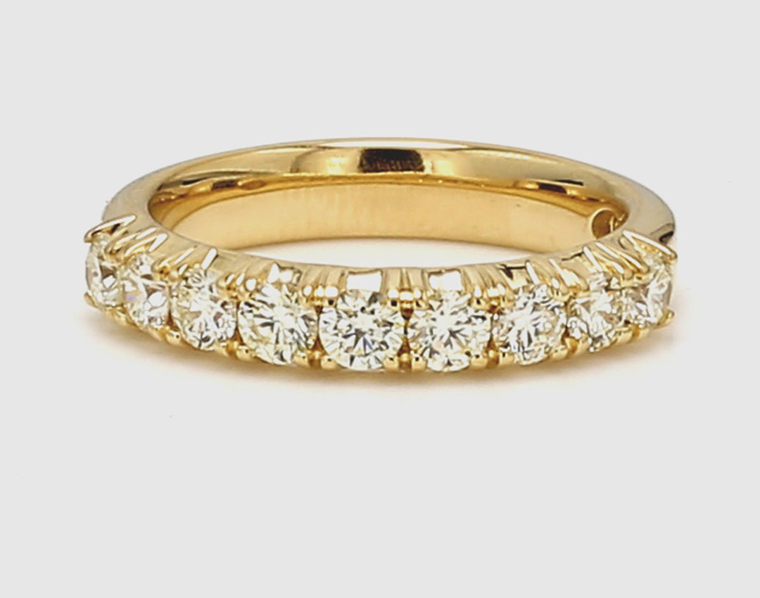 9-stone band in 18K YG with basket prong set round diamonds.  D0.77ct.t.w.  Size 5.5