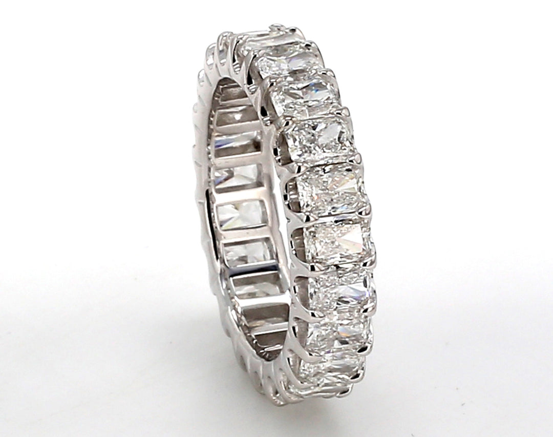 Eternity band in platinum with basket prong set (23) radiant cut diamonds.  D4.86ct.t.w.  Size 7