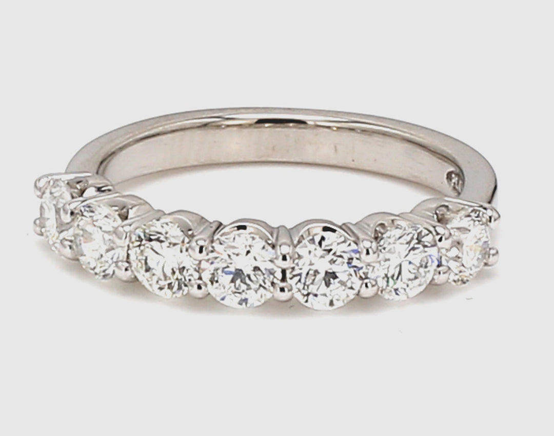 7-stone band in platinum with prong set round diamonds.  D1.28ct.t.w.  Size 6