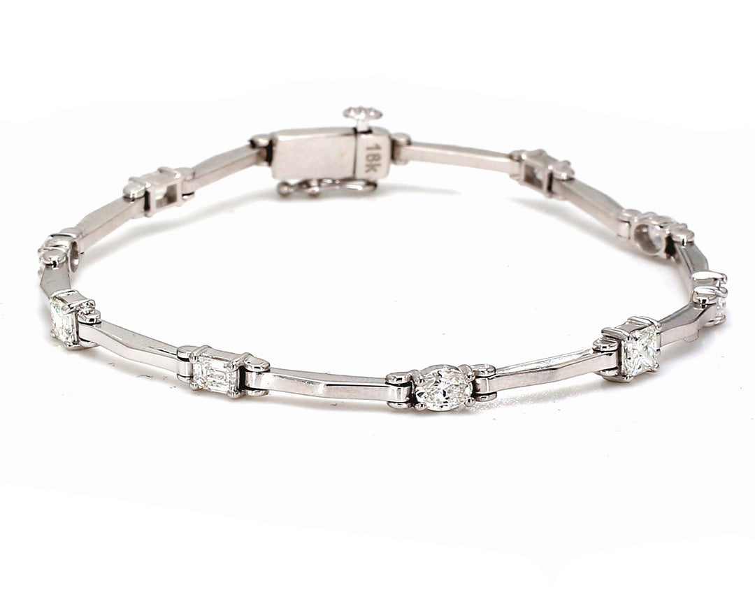 7"" Bracelet in 18K WG with prong set (11) different shaped diamonds.  D2.21ct.t.w.