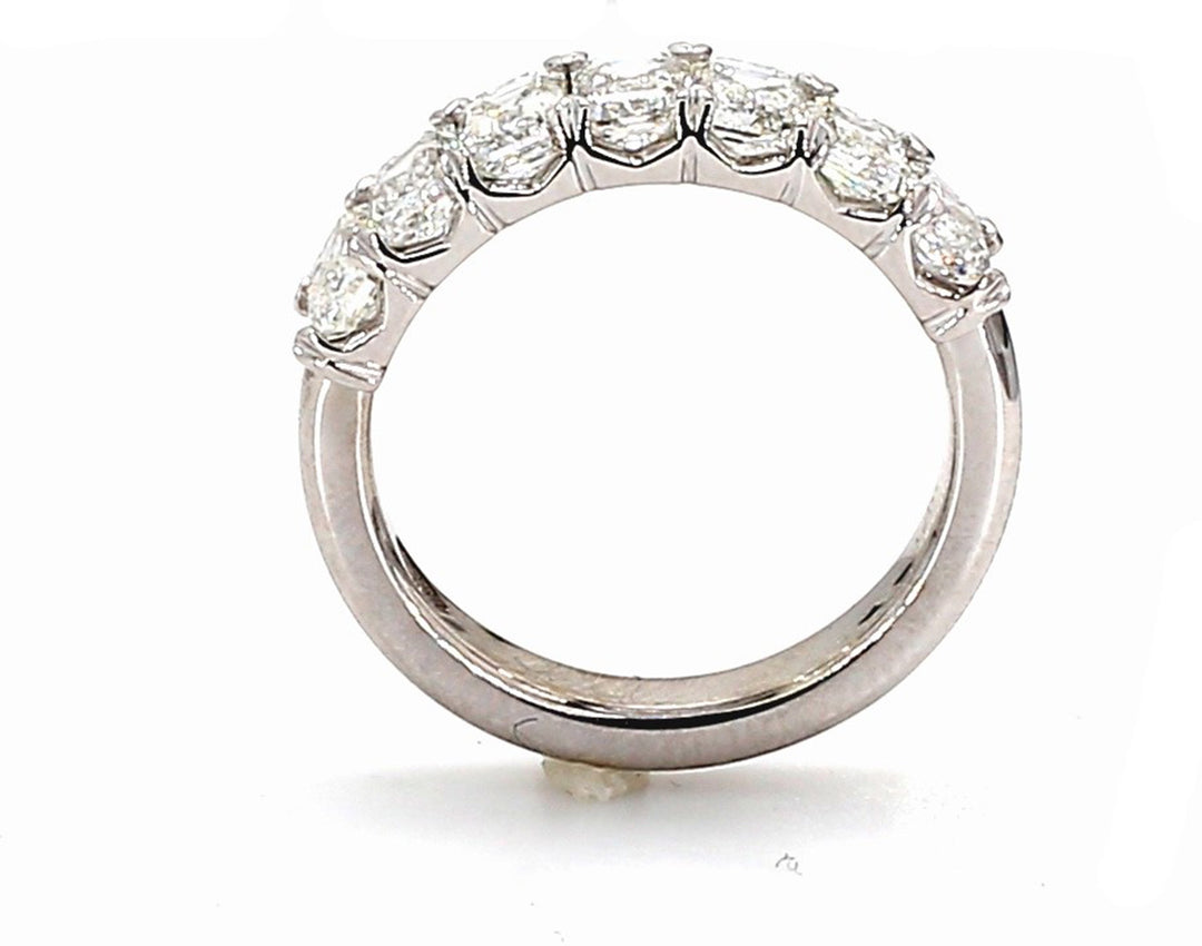 7-stone band in platinum with prong set emerald cut diamonds.  D2.15ct.t.w.  Size 5.25