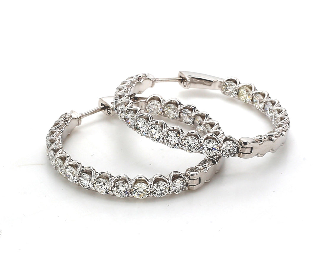 1.20"" Inside out hoop earrings with U-prong set round diamonds.  D7.48ct.t.w.