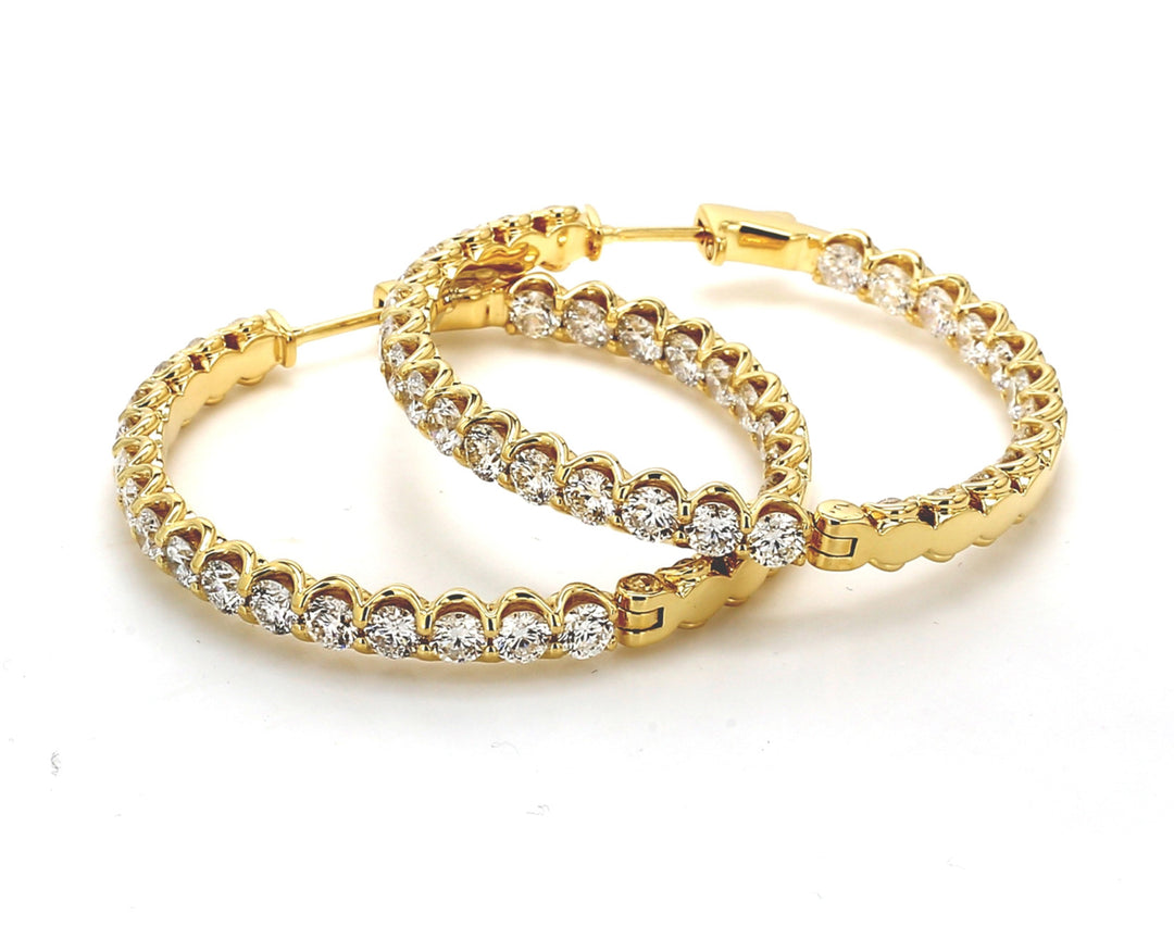 1.50"" Inside out hoop earrings in 18K YG with U-prong set round diamonds.  D9.52ct.t.w.