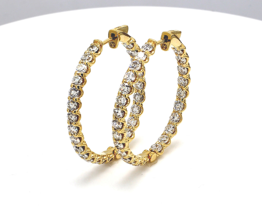 1.20"" Inside out hoop earrings in 18K YG with U-prong set (50) round diamonds.  D5.25ct.t.w.
