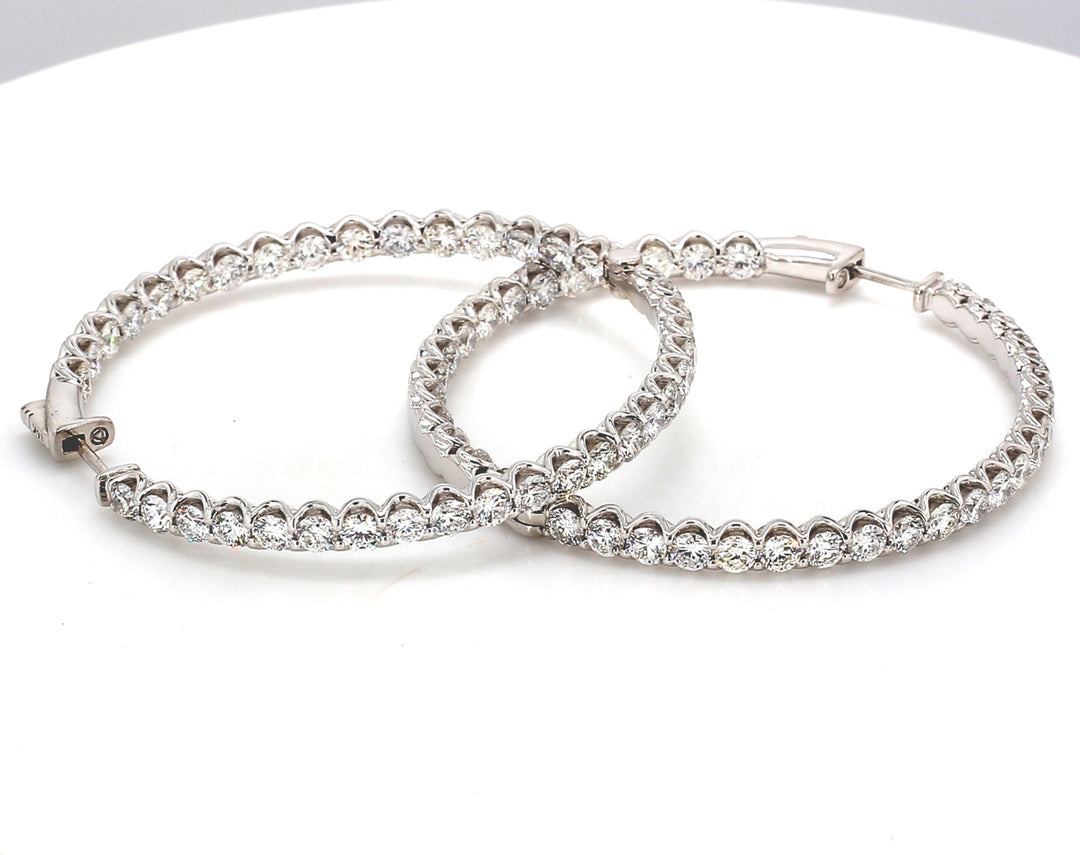 1.80"" Inside out hoop earrings with U-prong set (76) round diamonds.  D7.98ct.t.w.