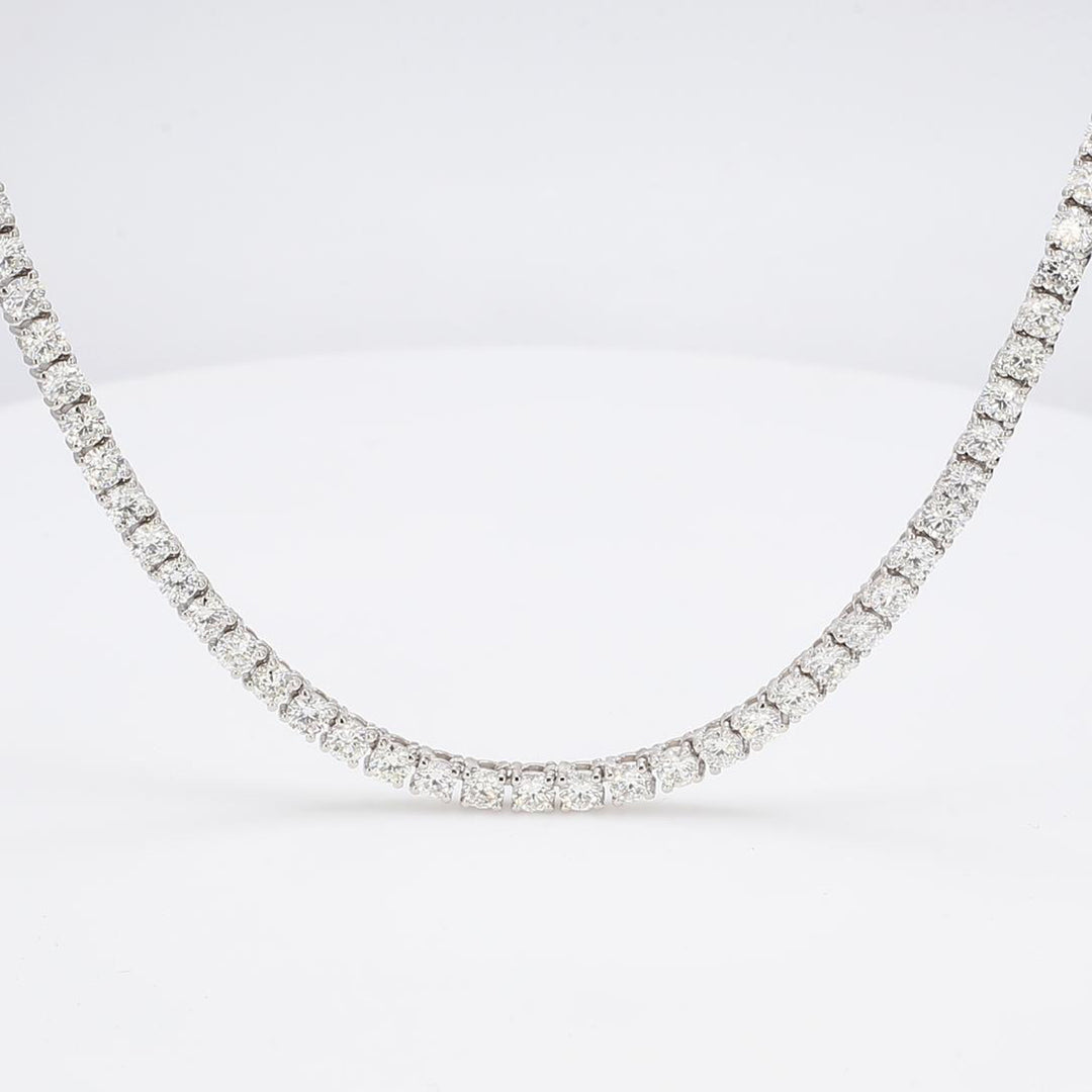 15"" Tennis necklace with 4-prong set (127) round diamonds.  D10.24ct.t.w.