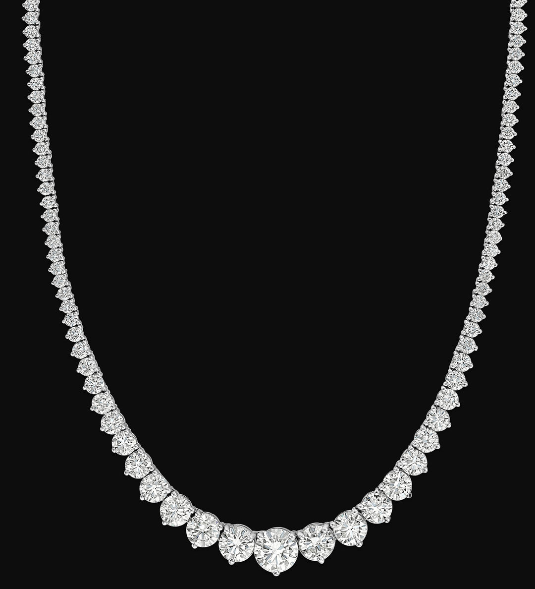 17"" Graduated tennis necklace with 3-prong basket set (151) round diamonds.  D18.96ct.t.w.  (Center - 1.70ct.)