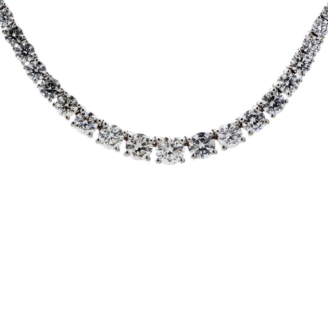 16"" Half way graduated tennis necklace in 18K WG w/ 4-prong set round diamonds.  D5.92ct.tw.