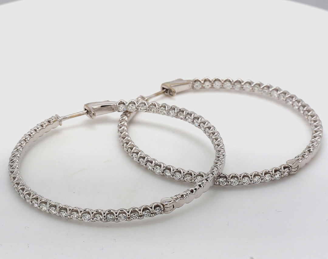 1.80"" Inside out hoop earrings with U-prong set (100) round diamonds.  D3.10ct.t.w.