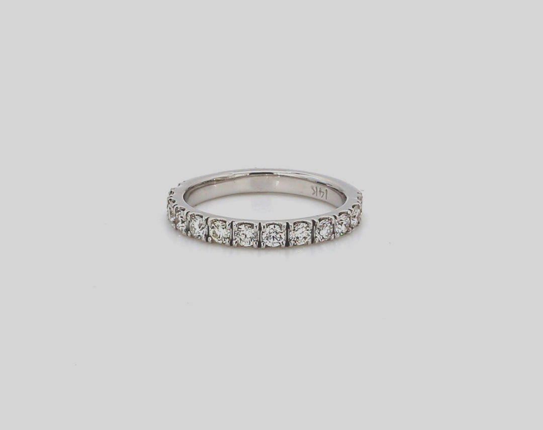 Band with u-prong set round diamonds.  D0.57ct.t.w.  Size 5