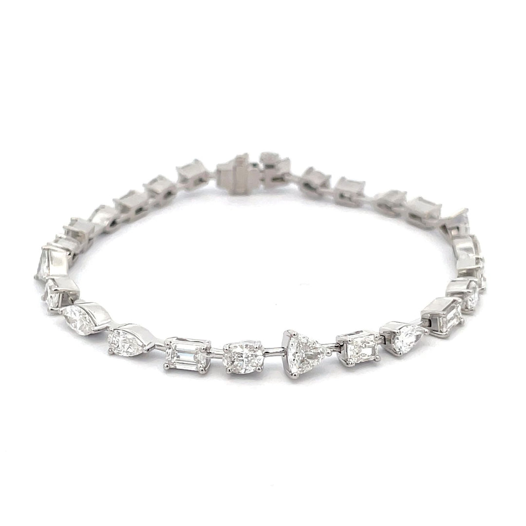7"" Bar bracelet in platinum with prong set multi-shape diamonds.  D6.29ct.t.w.