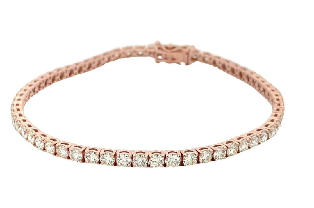 7"" Tennis bracelet in 14K RG with basket prong set (60) round diamonds.  D4.95ct.t.w.