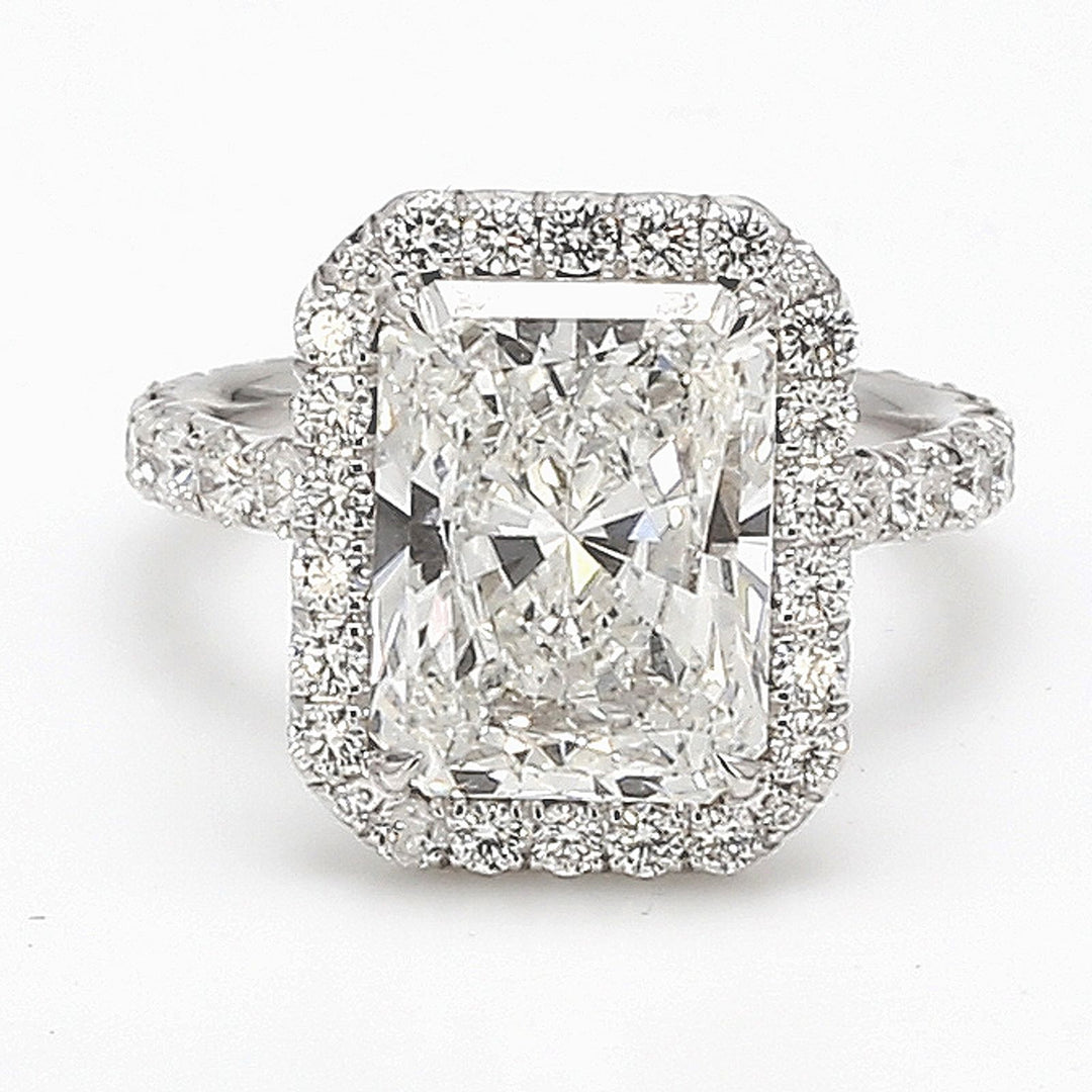Halo semi-mount in platinum with round diamonds.  D1.00ct.t.w.