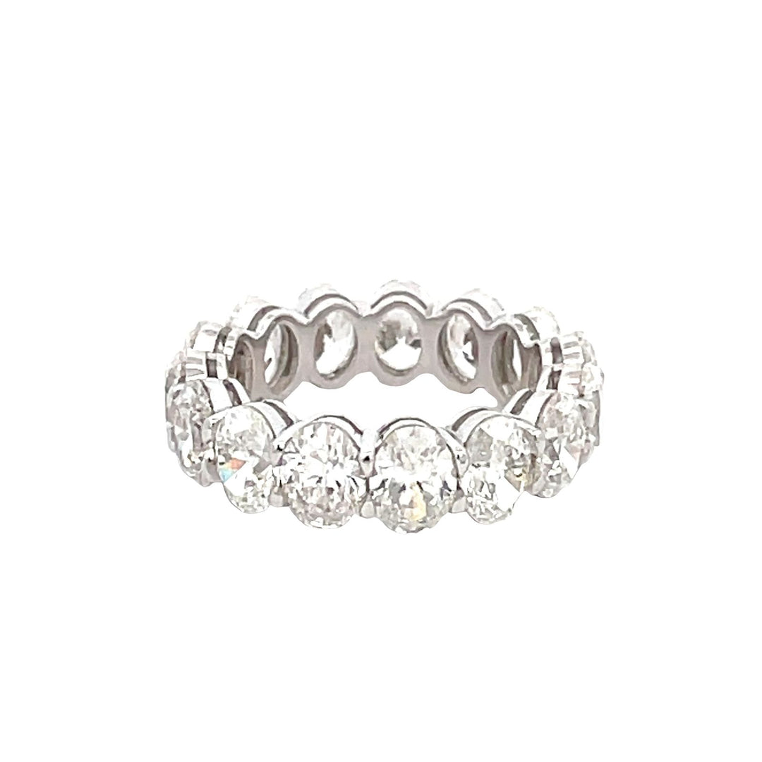 Eternity band in platinum with basket prong set GIA certified G-I /VVS1-SI1 (15) oval diamonds.  D5.99ct.t.w.  Size 5.25