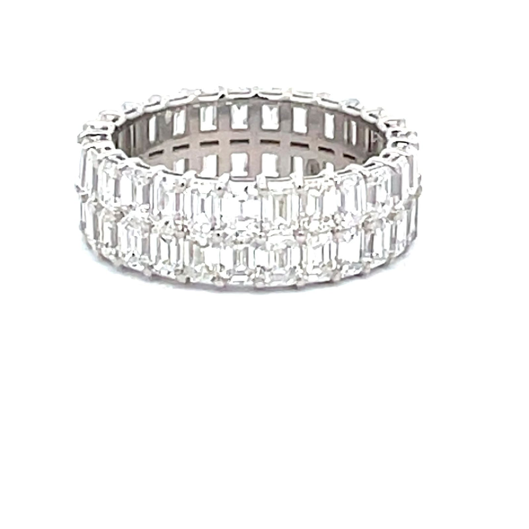 Two-row eternity band in 18K WG with prong set (54) emerald cut diamonds.  D4.97ct.t.w.  Size 5