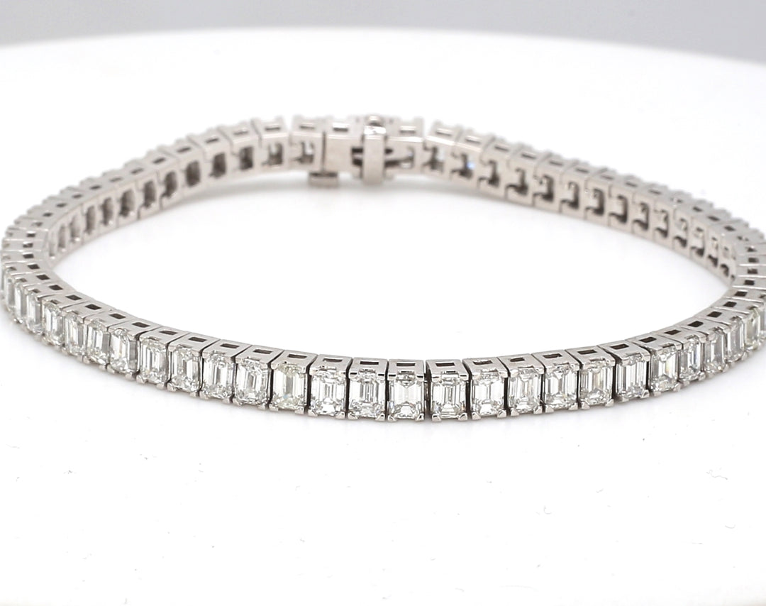 7"" Tennis bracelet in platinum with 4-prong basket set emerald cut diamonds.  D8.85ct.t.w.