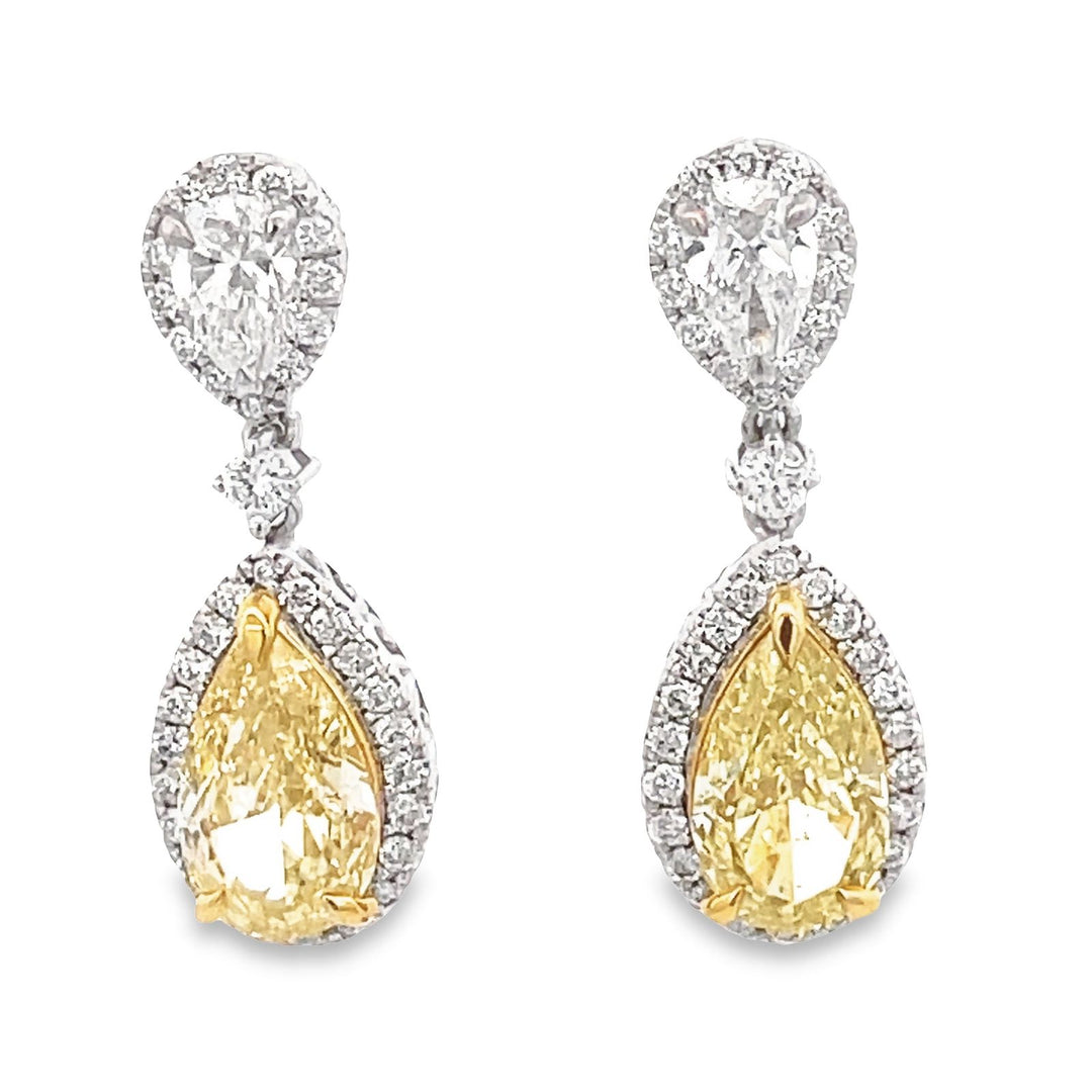 Dangling drop earrings in 18K WG with GIA certified FY pears and D/VS1 inverted pear shape diamonds on top.  D5.95ct.t.w.  (Center - 4.13ct. t.w.)