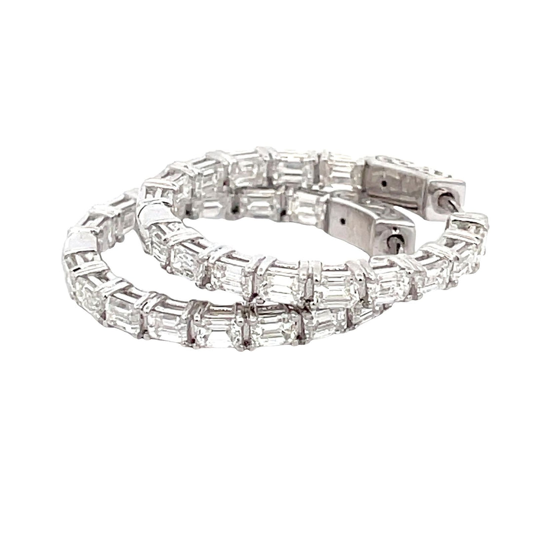 1"" Inside out hoop earrings with basket prong set (30) emerald cut diamonds.  D2.78ct.t.w.