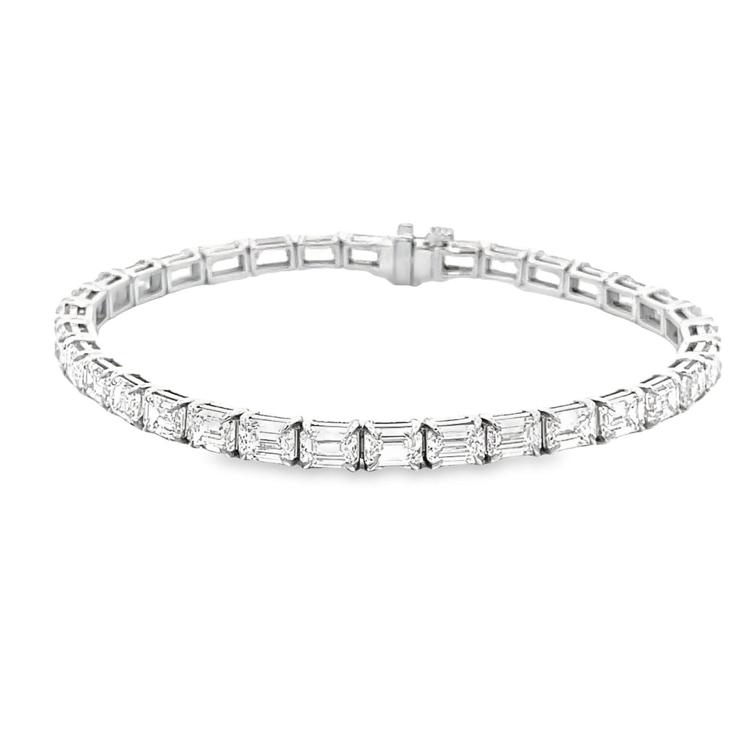 7"" Tennis bracelet east to west style in platinum with basket prong set GIA certified E-G/IF-VS2 (34) emerald cut diamonds.  D13.76ct.t.w.