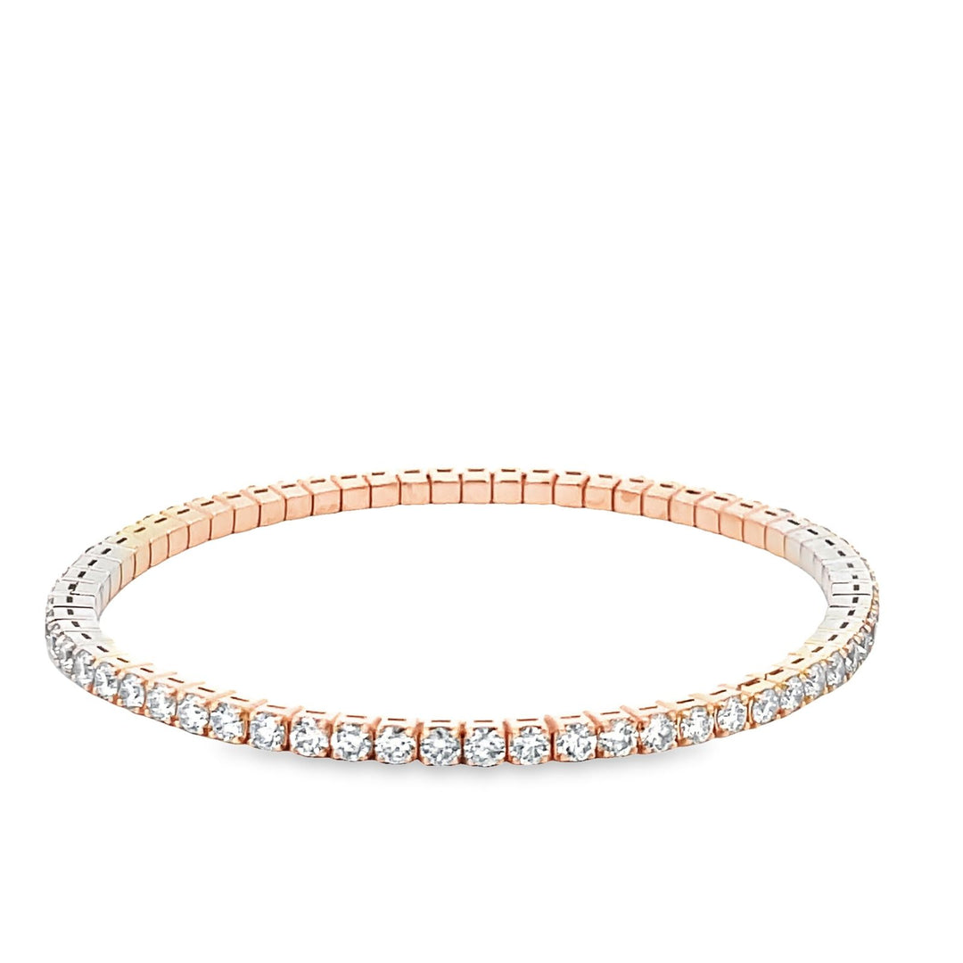 Flex tennis bangle in 18K RG with 4-prong set round diamonds.  D2.69ct.t.w.
