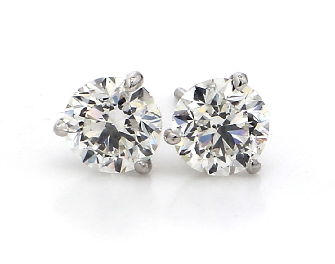 Screw back stud earring martini style with USA certified G/SI2 round diamonds.  D4.01ct.t.w.